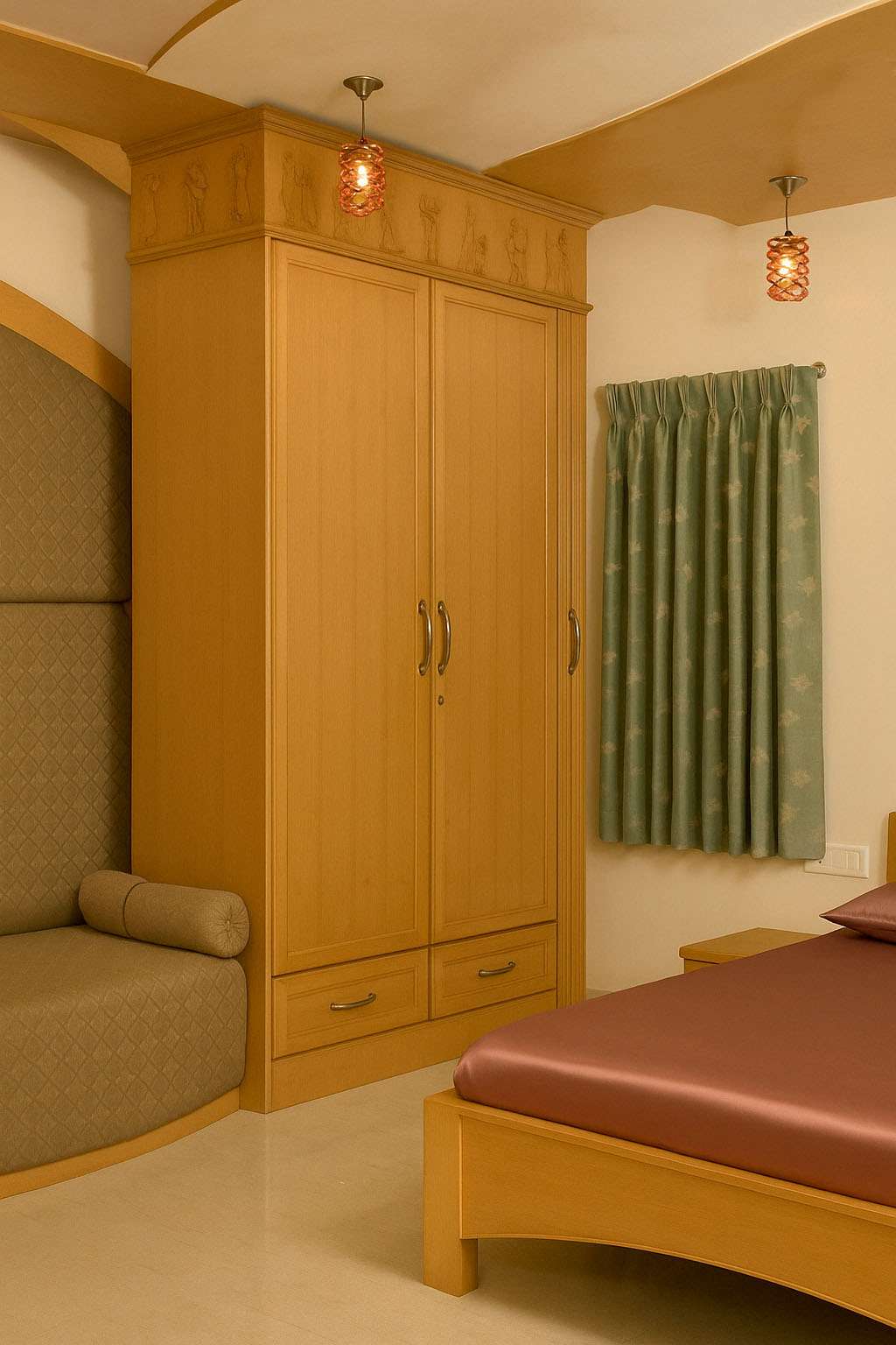 Designed and executed by top interior designers - Custom-built modular wooden wardrobe with carved loft storage, integrated cushioned seating, and warm-toned bedroom interior — this project is at Coimbatore, Tamilnadu, India.