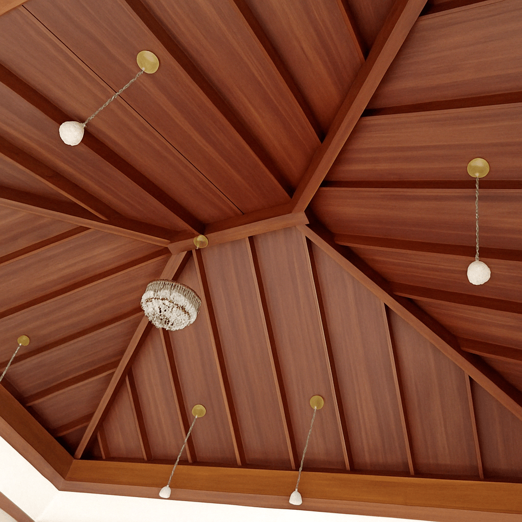 Custom wooden pitched ceiling with symmetrical panel layout and pendant lighting, designed and executed by our interior team for a premium residence in Tamil Nadu.